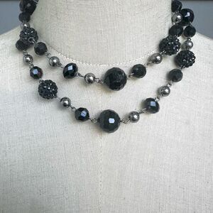 Black and silver tone long beaded necklace